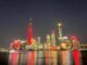Oriental Pearl and Shanghai Tower together with towers around the worldlight up in red in celebration of the Spring Festival of the Year of the Snake